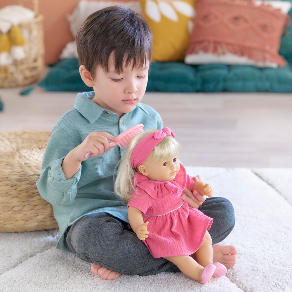 Corolle Jade nurturing scene illustrating versatile, imaginative play scenarios.