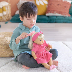 Corolle Jade nurturing scene illustrating versatile, imaginative play scenarios.