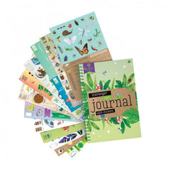 Craft-Tastic kids using journal outdoors enjoying nature-inspired creativity.
