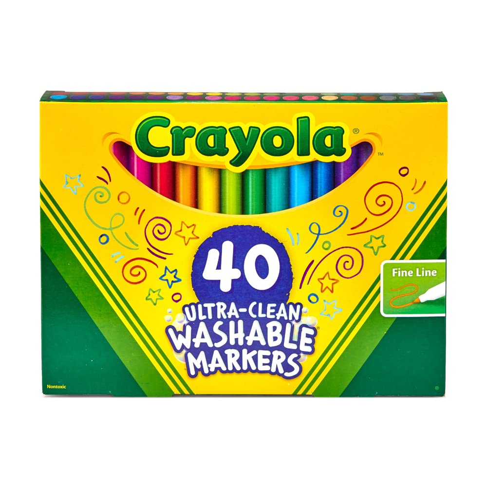 Child drawing with Crayola Ultra Clean markers for a meticulous coloring page.
