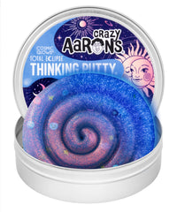 Crazy Aaron's Thinking Putty Total Eclipse glows in the dark for night play.