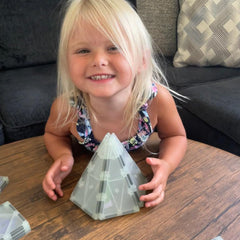 CreateOn Crayola Glow Doodle Tiles in small hands exploring shapes and colors.