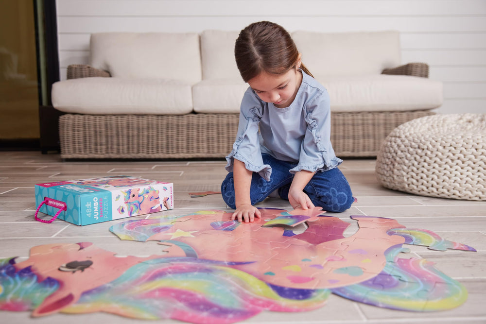 Crocodile Creek Above and Below unicorn puzzle on the floor invites family play.