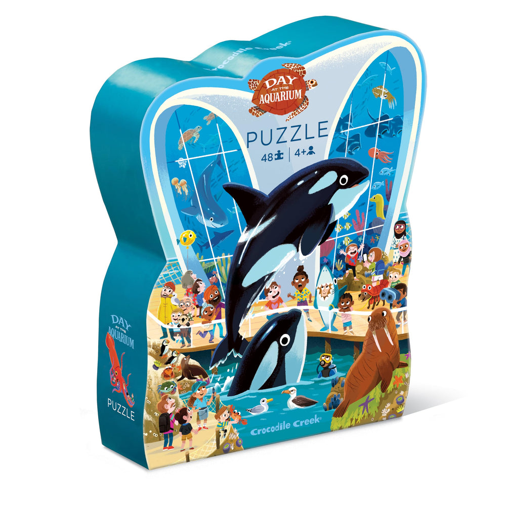 Crocodile Creek Day at the Aquarium puzzle box front sparks curiosity