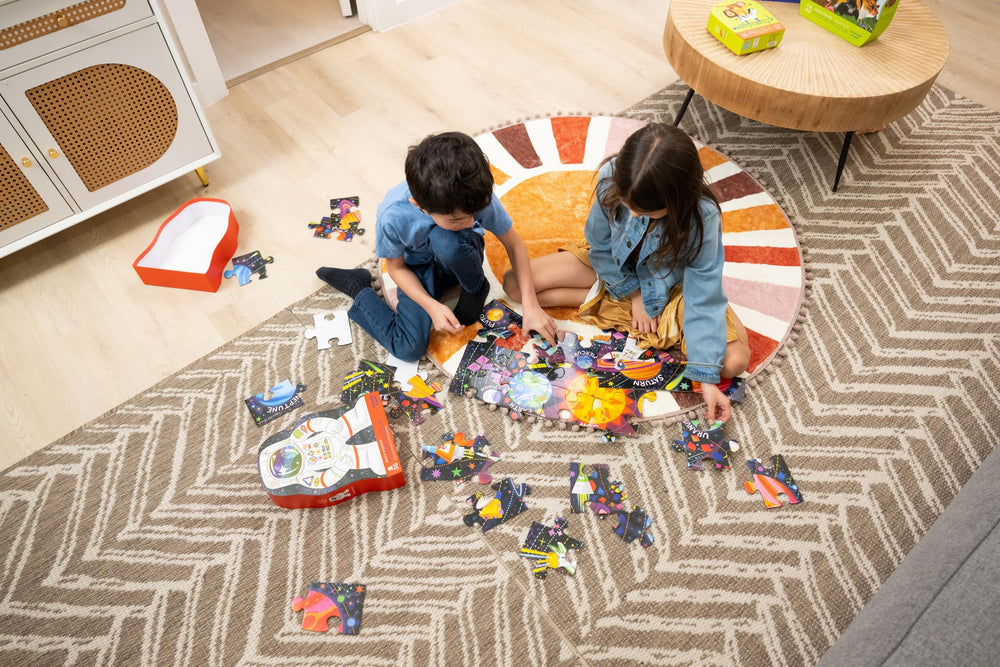 Child playing Crocodile Creek puzzle promotes focus and patience