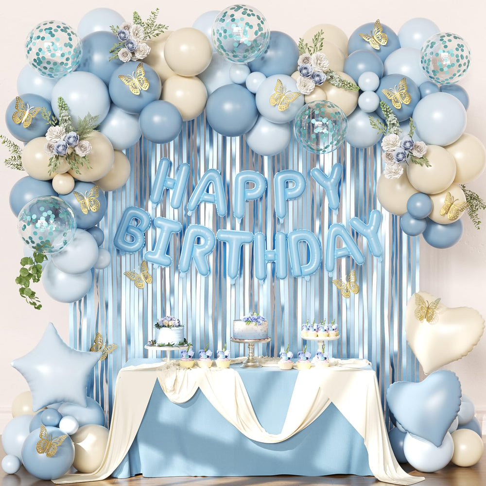 Crossfingers blue-foil-fringe-curtains create a stunning birthday backdrop for photos.