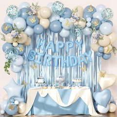 Crossfingers blue-foil-fringe-curtains create a stunning birthday backdrop for photos.