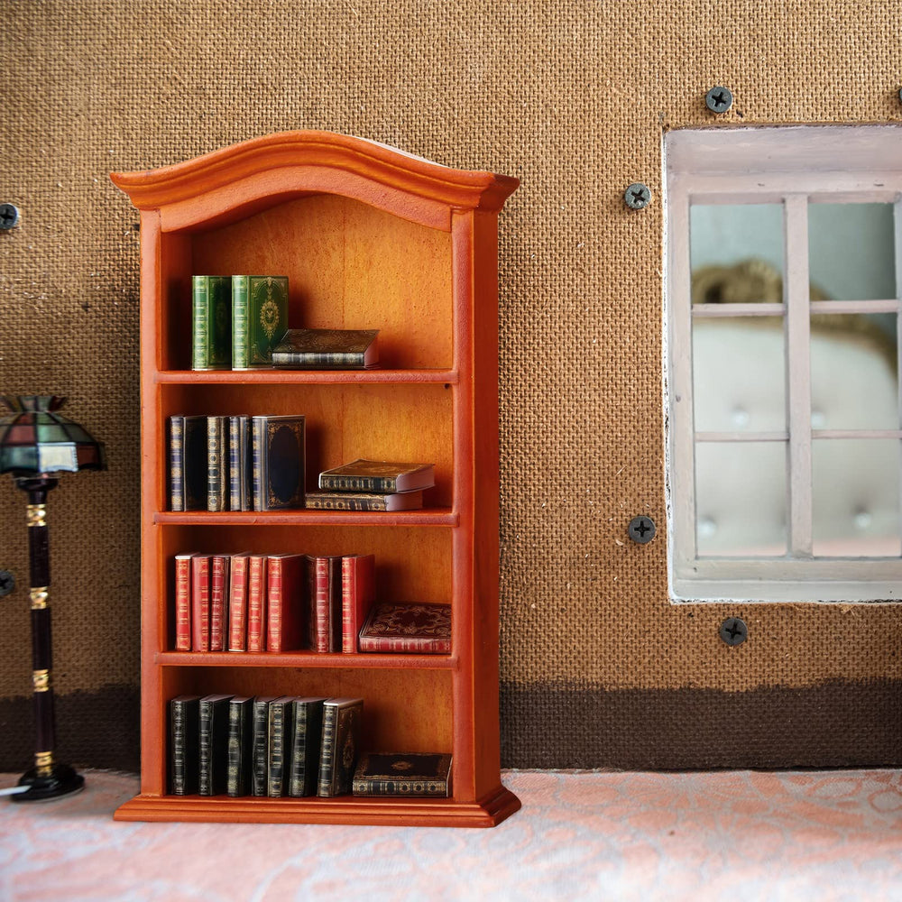 Crtiin 1:12 scale study area in a dollhouse with a book-filled shelf