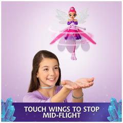 Crystal Flyers metallic accessories and glitter dress shine in air.