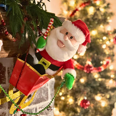 Cuddle Barn Jingling Santa soft plush material for cozy hugs
