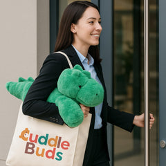 Cuddle Buds weighted dinosaur on bed—soft bedtime buddy for kids and adults.
