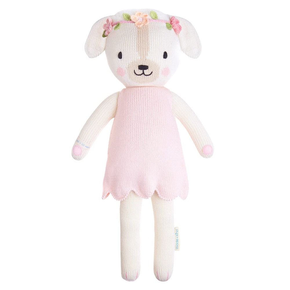 Cuddle + Kind Charlotte dog 13-inch doll close-up showing soft knit texture.