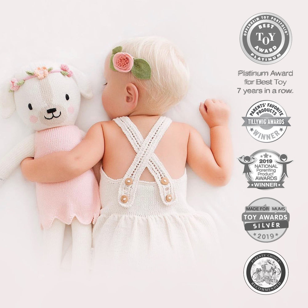 Cuddle + Kind Charlotte doll hand-knit close-up highlighting craftsmanship.