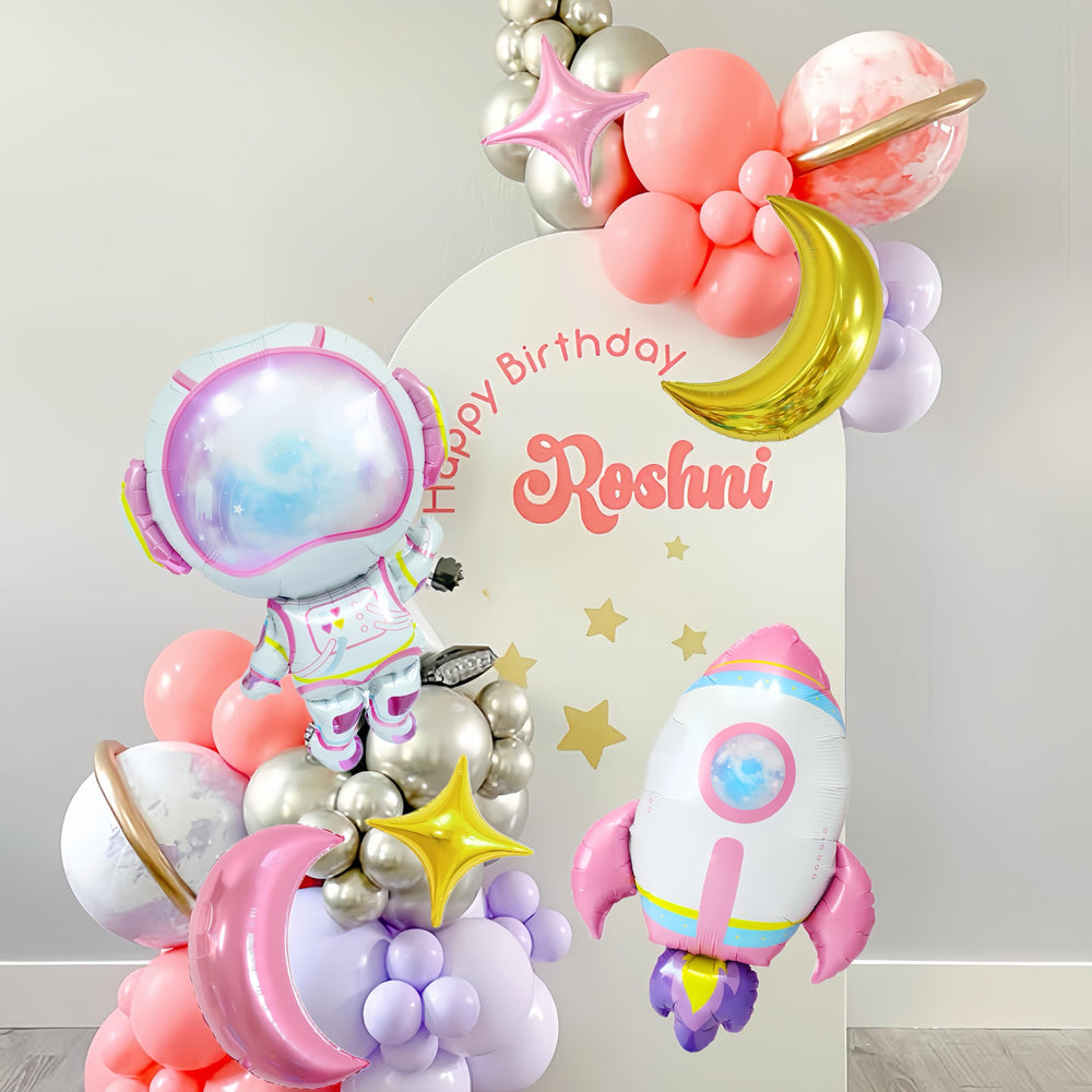 CYMYLAR moon balloons provide dreamy lunar accents for the display.