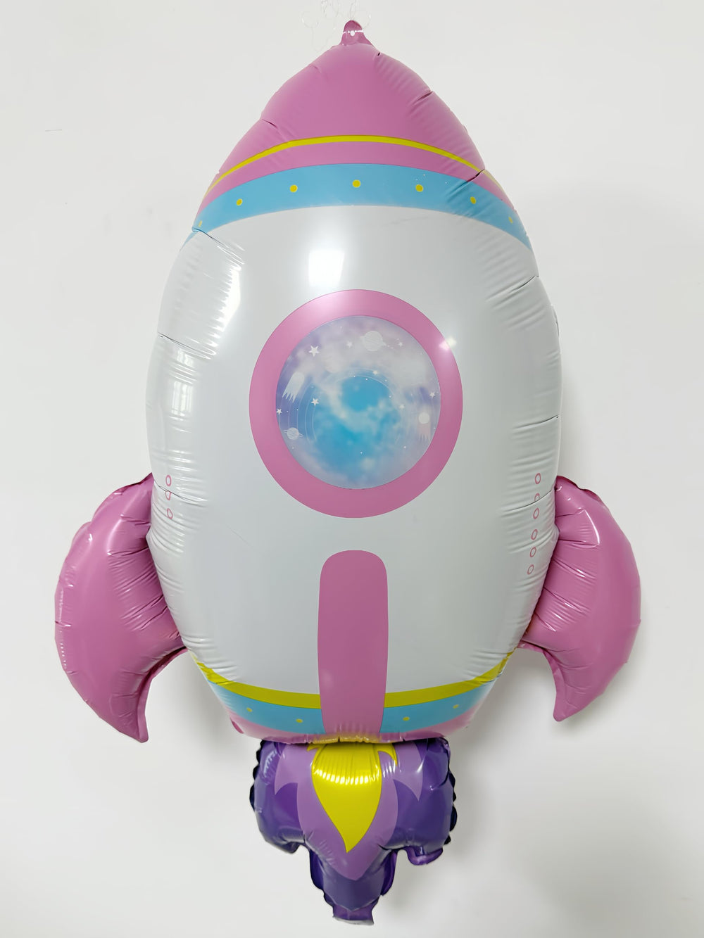 CYMYLAR rocket balloons in pink and purple add a bold focal point for photos.