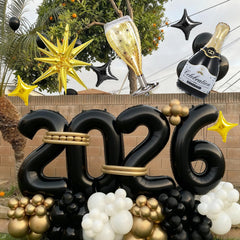 Dagelar black champagne bottle balloon for festive tabletop decor.