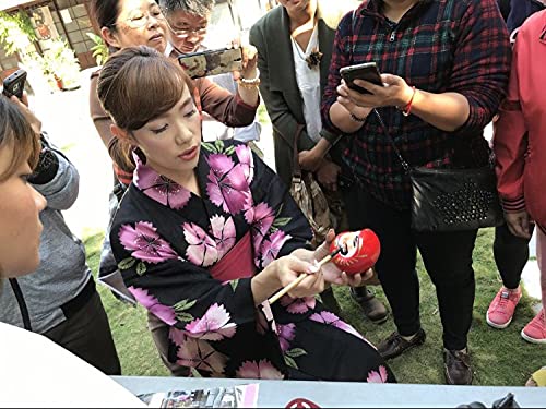 Daimonya Daruma Doll in red as a good fortune symbol for daily rituals.