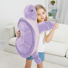 Dalmao child-friendly sea turtle plush as bedroom decor.