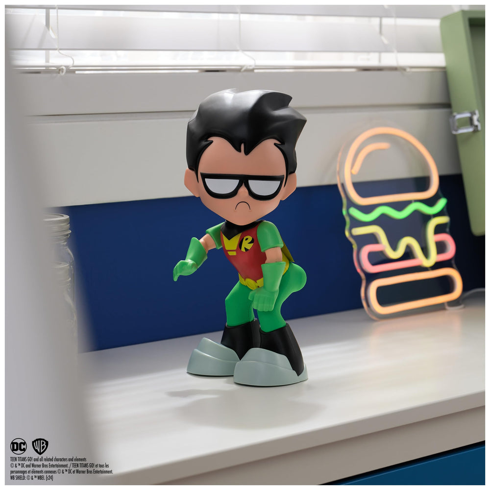 Robin figure from DC Comics performs twerk motion for humorous display