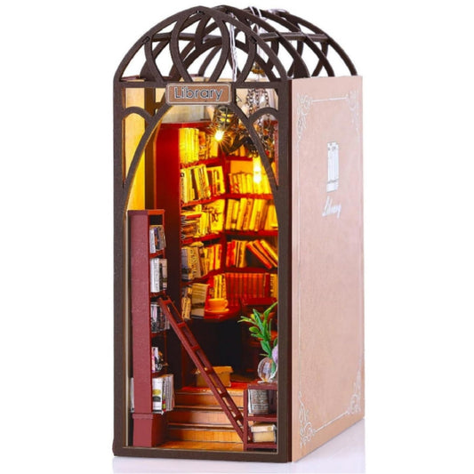 DCLFIRMX DIY Book Nook Kit with LED lights creates a cozy library ambiance.