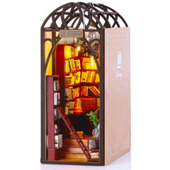 DCLFIRMX DIY Book Nook Kit with LED lights creates a cozy library ambiance.