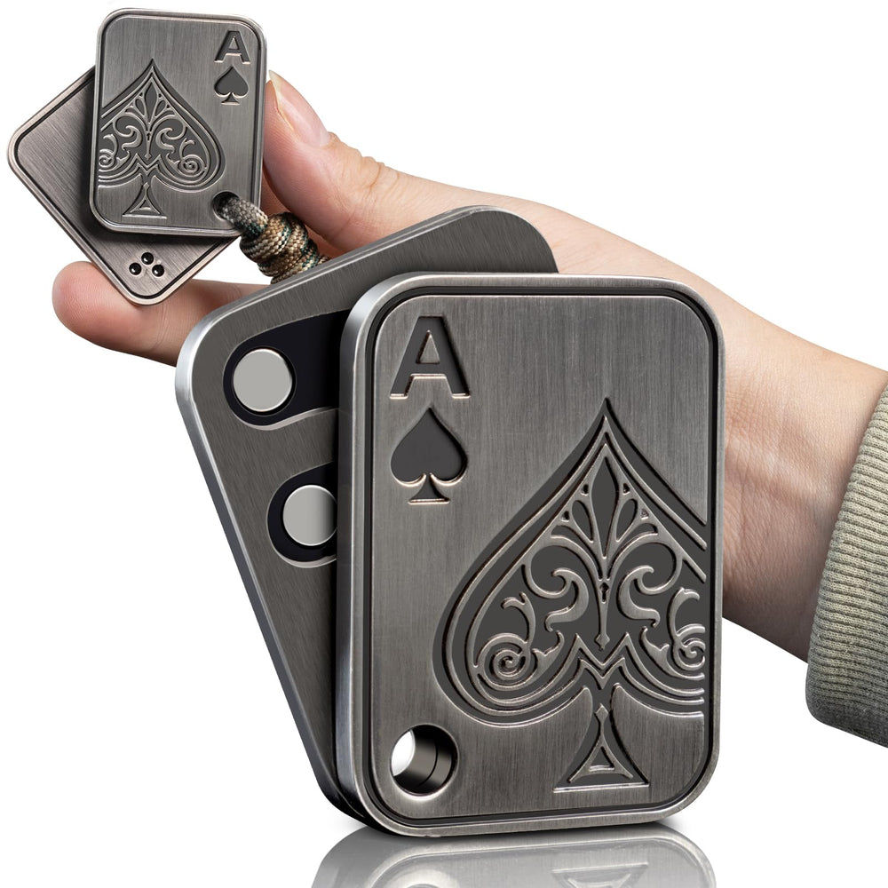 D.G.PLAYER fidget pendant gray front view highlights portable stress-relief design.