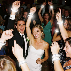 Durable white LED wristband offers party-friendly, long-lasting glow.
