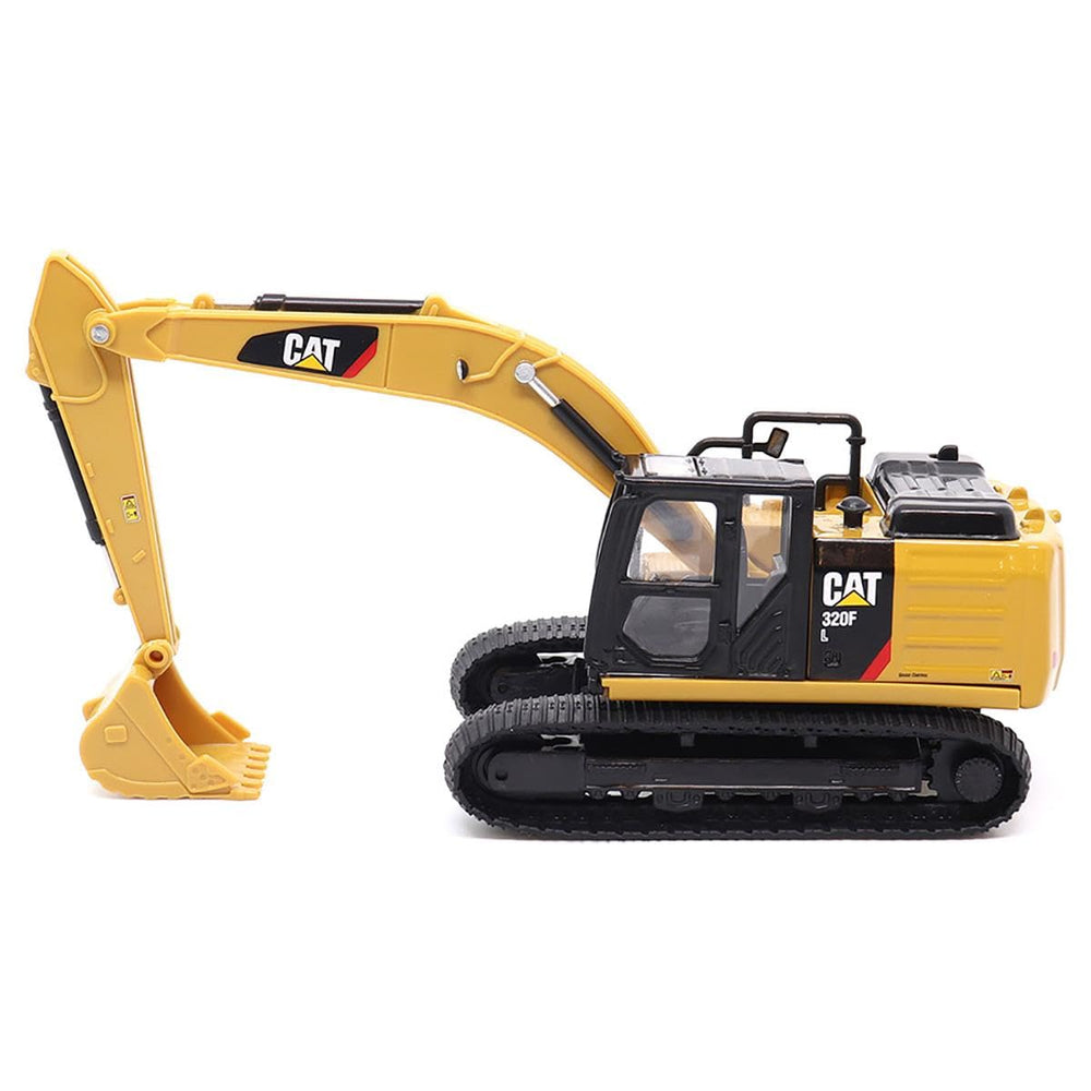 Diecast Masters 320F L with working boom showcases realistic loading action.