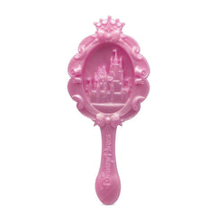 Disney Store Rapunzel doll with molded brush included for styling.