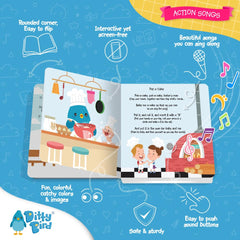 Ditty Bird toddler reading the sound book with colorful pages