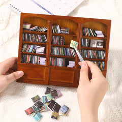 DIYDEC mini bookshelf with mini white sofa framing a cozy desk setup