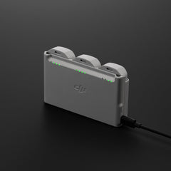 DJI Neo Two-Way Charging Hub included in the box for quick setup.