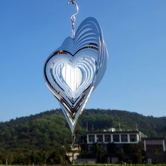 DJUAN reflective wind spinner adds color shifts with sun and breeze.