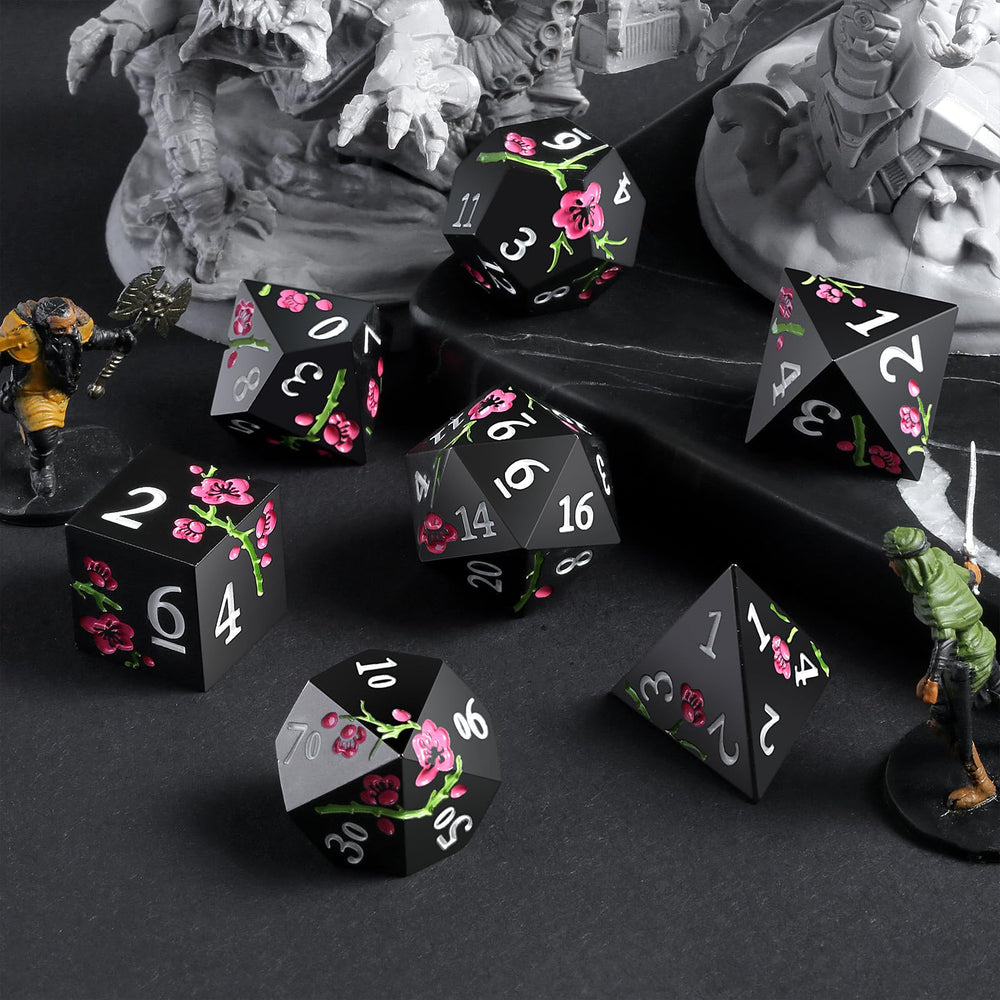DNDND flower metal dice D6 in matte black with pink flower, sturdy for immersive sessions.