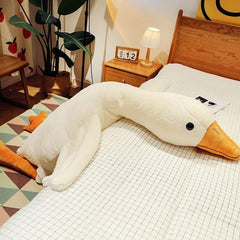Doireum Swan weighted plush being hugged by a child for comforting play