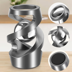 Dolasev kinetic desk toy on an office desk for daily use
