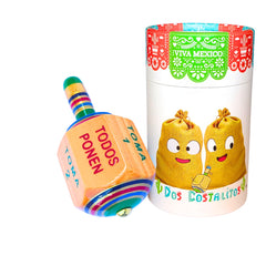 Dos Costalitos wooden top spinning in hand, adds authentic Mexican game charm.