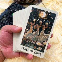 DPEHAKMK floral tarot guidebook close-up showing beginner-friendly meanings.