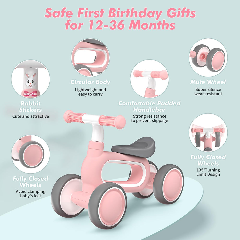 DRAMATION baby balance bike pink wheels close-up with silent tires for calm rides.