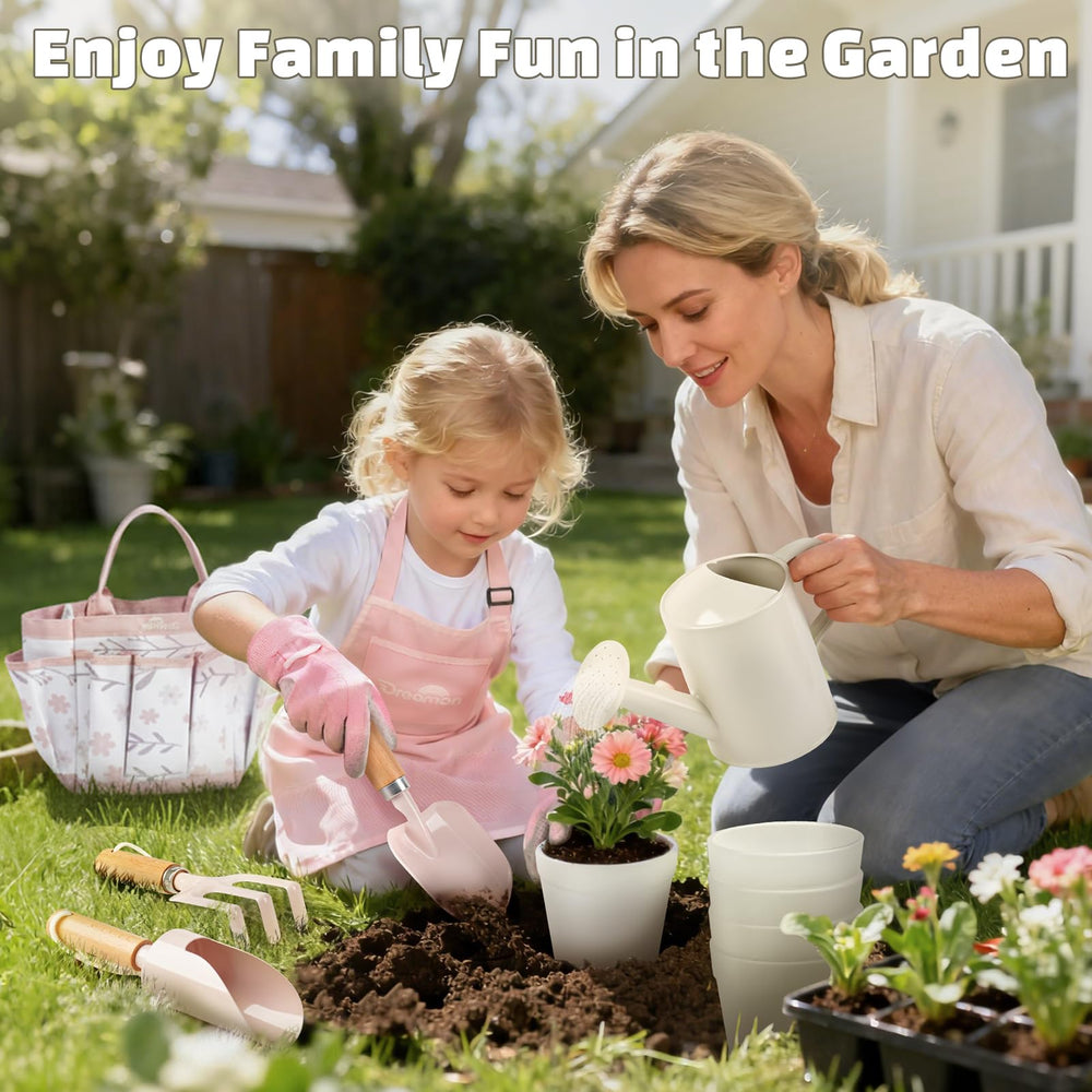 Dreamon pink garden apron keeps clothes clean while young gardeners dig.