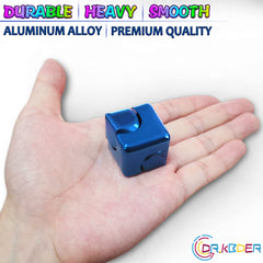 Dr.Kbder fidget cube on desk, decorative and functional for focus.