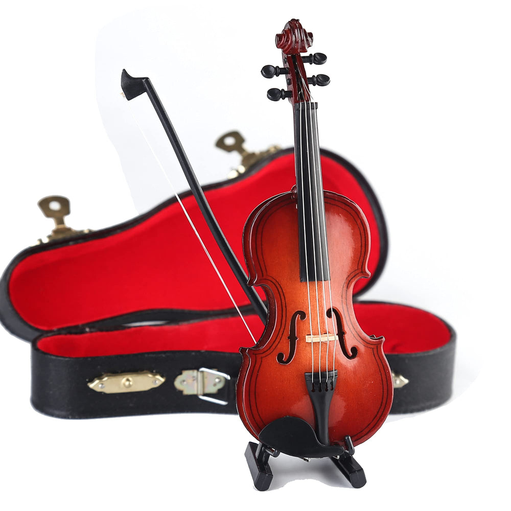 Dselvgvu miniature violin on desk enhances music-themed decor