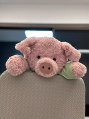 EASELR pig plush close-up shows round button eyes for playful charm.