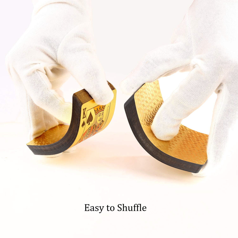 Gold-colored box packaging protects decks with a hard plastic case