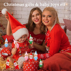 eboozone Tiny Elf Baby Doll in a Christmas scene, enhances seasonal décor.