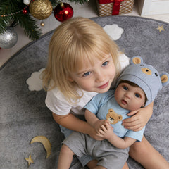 EKOKIZ Reborn Dan face detail highlights realistic features for imaginative nurturing play.