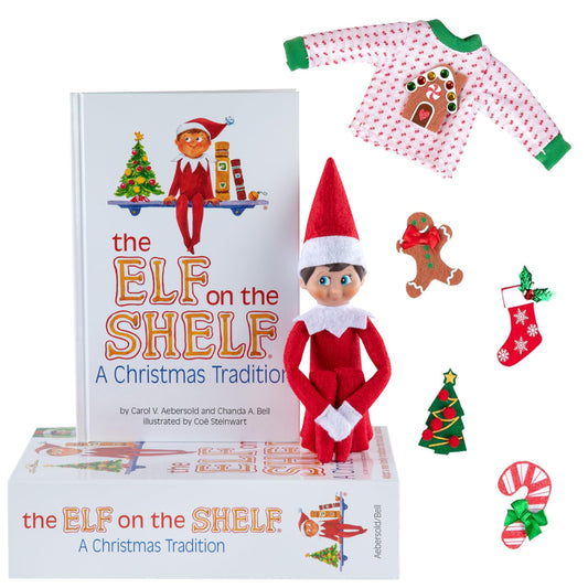 The Elf on the Shelf Boy with Ugly Sweater Set blue-eyed elf doll with interchangeable outfits.