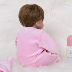 Weighted soft-bodied ENADOLL doll for realistic handling and gentle play.