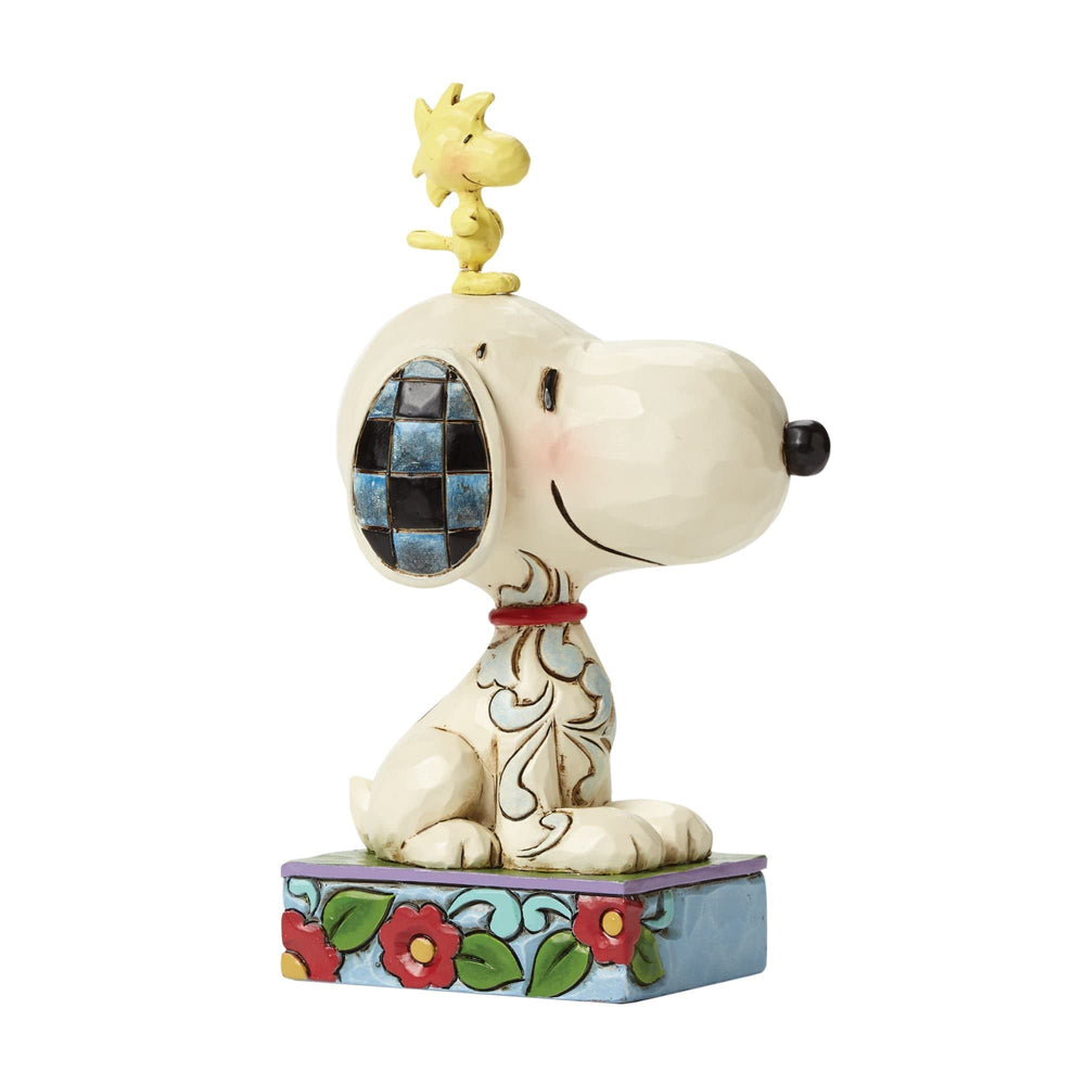 Enesco 5-inch Snoopy and Woodstock figurine for tabletops.