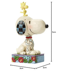 Jim Shore style Enesco figurine with folk-art detailing.